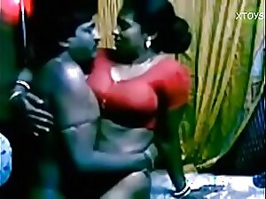 Neighbors indulging in passionate Tamil sex, uninhibited and unafraid, creating a desi porn masterpiece.