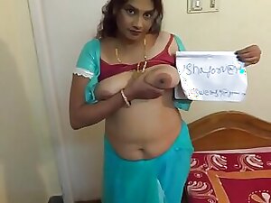 Middle-aged Telugu woman engages in explicit sexual act