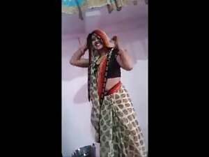 Watch an Indian beauty seductively dance, revealing her tight ass and mouth. Full HD quality.