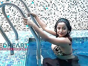 Vigorous Desi lady swims and gets naughty in steamy room